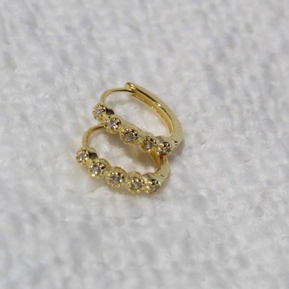 Sterling Silver Gold Huggie Hoops with Row of Isolated Simulated Diamonds - Picture 3 of 12